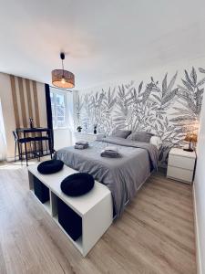 Appartements Appartement lumineux au coeur de la ville : photos des chambres