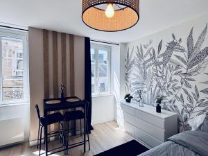 Appartements Appartement lumineux au coeur de la ville : photos des chambres