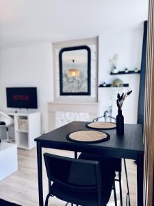 Appartements Appartement lumineux au coeur de la ville : photos des chambres