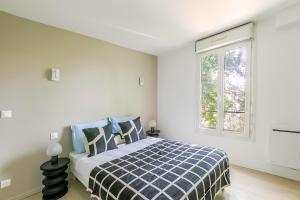 Appartements Studio lumineux a deux pas des commerces- Asnieres : photos des chambres