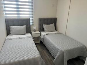 DEPARTAMANTO NUEVO EN CHILLÁN, ESTACIONAMIENTO Y AIRE ACONDICIONADO a