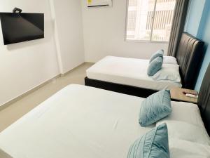 Apartamentos frente a la playa Palanoa Rodadero - By Bedviajes