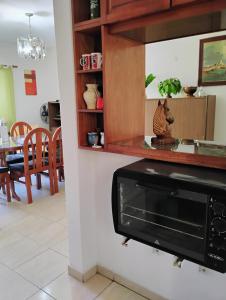 departamento de excelente ubicación, cochera , aire acondicionado