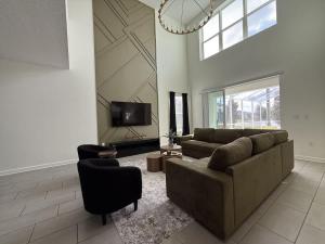 Serene Green Villa- Your Perfect Getaway NearThe Fun