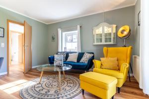 Ferienhaus Süderpiep – 4 individuelle Ferienwohnungen nahe Südstrand Ferienwohnung Seestern – stilvolles Erdgeschossdomizil mit Terrasse