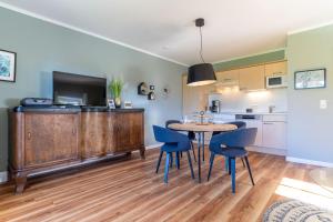 Ferienhaus Süderpiep – 4 individuelle Ferienwohnungen nahe Südstrand Ferienwohnung Seestern – stilvolles Erdgeschossdomizil mit Terrasse