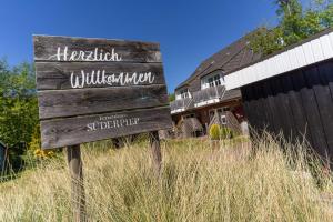 Ferienhaus Süderpiep – 4 individuelle Ferienwohnungen nahe Südstrand Ferienwohnung Auster – helle Maisonette mit 2 Schlafzimmern & Balkon