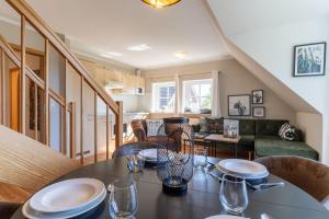 Ferienhaus Süderpiep – 4 individuelle Ferienwohnungen nahe Südstrand Ferienwohnung Möwe – stilvolle Maisonette für bis zu 4 Personen