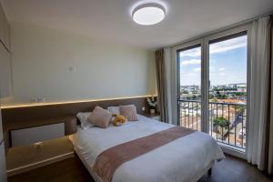 Appartements Appartement Luxueux a 30min de la Tour Eiffel : photos des chambres