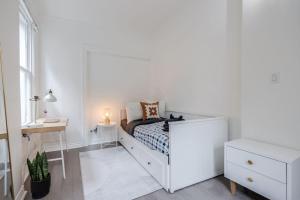 Cozy Retreat with 2BR, Smart TV, AC, and Laundry
