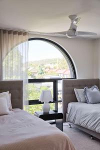 Light-Filled City Escape, Walk to Cafes and Parking