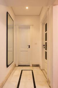 Stay& Discover 77 by Spacey 62 - 1BR in Maadi