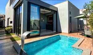 House in a Climatized Condominium with heated pool