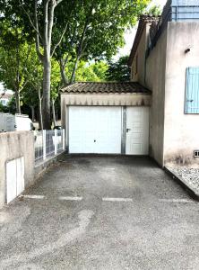 Appartements Grand jardin - Climatisation - parking privatif : photos des chambres