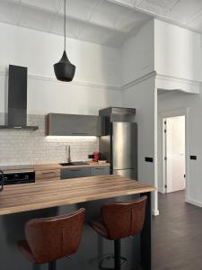 Luminoso ático con vistas a la iglesia, Casa Ángel Giner