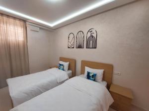 Safari Stay Appart front mer avec piscine