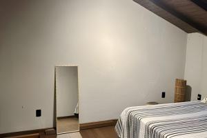 Uma Casa na Praia do Rosa com Jacuzzi