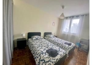 Appartements Beau T3 a proximite du centre, 2 ch, 3 lits : photos des chambres