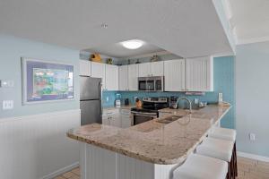 Pelican Beach Resort Top 20th Floor Condos with Ocean View