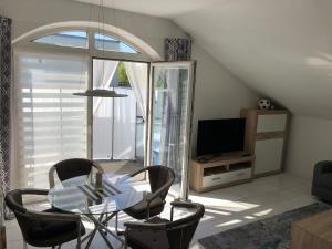 Bright attic apartment near Augsburg