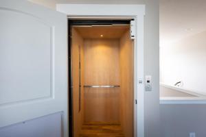 Semi-Oceanfront Retreat with Pool Theater Elevator