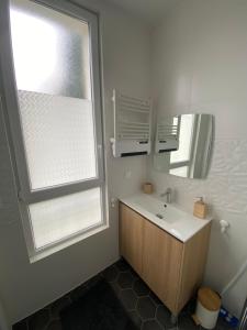 Appartements Studio a cote du parc des expositions porte de Versailles, proche metro : photos des chambres