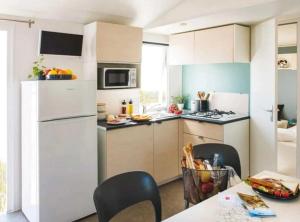 Campings Chalet 4 etoiles - Piscine - efa00d : photos des chambres