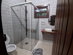 Casa com Piscina e 3 Suítes - Litoral Norte - Boiçucanga