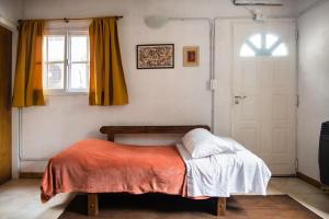 Pequeña casita con balcón privado