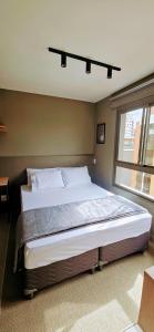 Ap novo, perto de Congonhas, com cama queen size