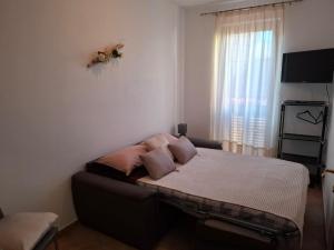 Camera Matrimoniale con Servizi Igienici in Comune