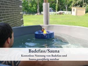 Familienfreundliche Ferienwohnung mit großem Garten, Spielplatz, privatem Badefass & Sauna