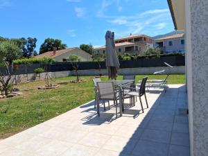 Maisons de vacances Villa et jardin proche de la plage et de Bastia : photos des chambres