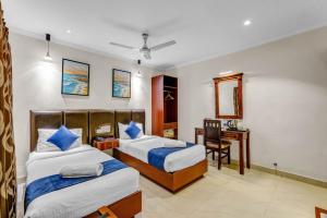 Blossoms Hotel & Service Apartments