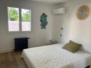 Villas Villa avec piscine et salle de sport : photos des chambres