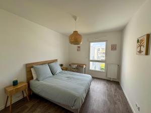 Appartements Nid Urbain - 3 Ch et Terrasse : photos des chambres