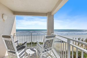 Palm House 3B with oceanfront views, pool, and private beach access