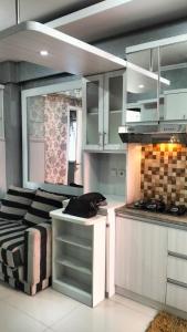 Apartemen green pramuka by Femi