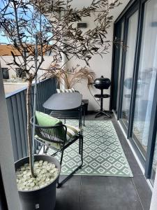 Appartements Appartement moderne avec deux chambres et parking : photos des chambres