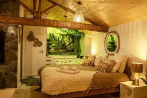 Appartements Loft & Spa Scandinave Romantique, King Size, TV 65 : photos des chambres