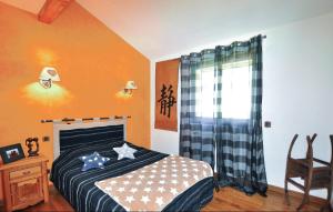 Maisons de vacances 5 Bedroom Amazing Home In Real : photos des chambres