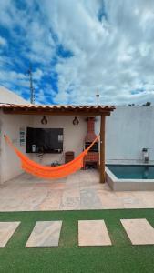 Casa Climatizada com Piscina e Área de Churrasco 400B