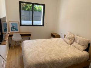 Villas Maison moderne plain-pied 3 chambres jardin preau : photos des chambres