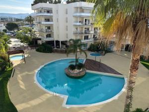 Bonito piso en Roses con piscina y parking AV-66