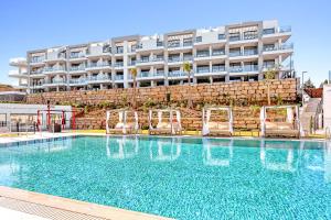 Appartement Mijas met Zee en Zwembadzicht