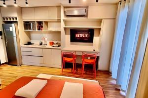 Studio Porsche - com piscina aquecida e academia.