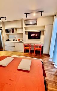 Studio Porsche - com piscina aquecida e academia.