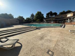 Villas Maison dans village vacances avec piscine : photos des chambres