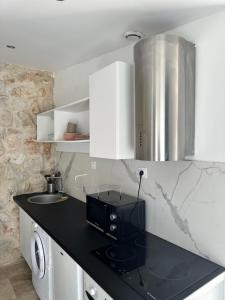 Appartements Jolie maison avec vue sur piscine : photos des chambres