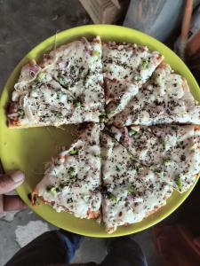 White lotus cafe inn tosh